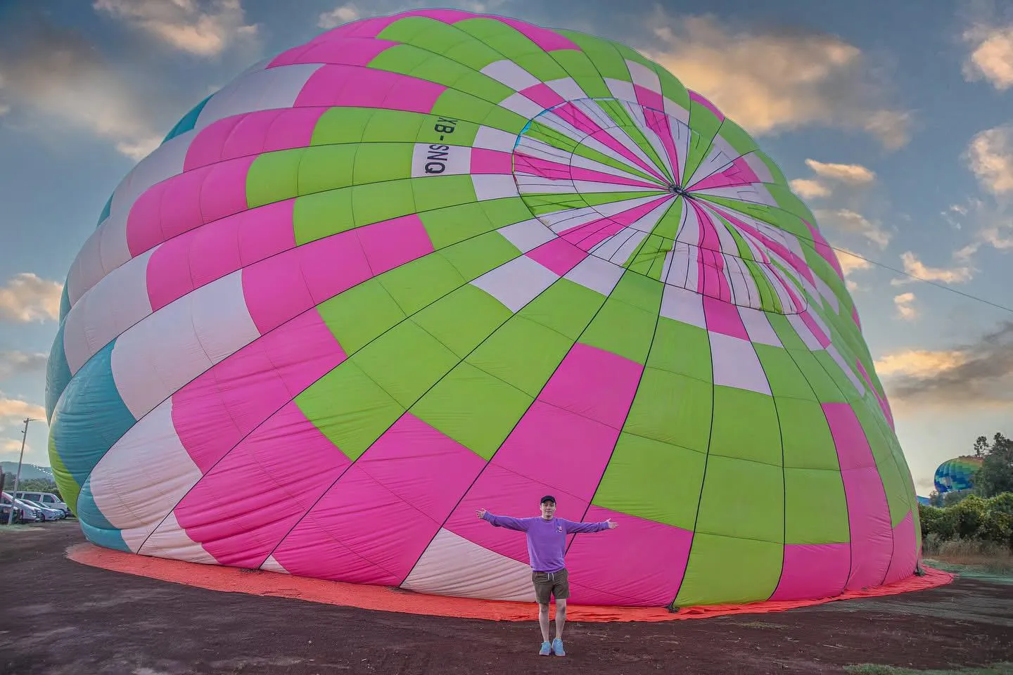 Two people enjoying a scenic ride after learning tips for an unforgettable hot air balloon ride.